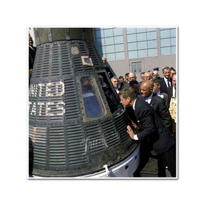 President John F. Kennedy Peers into Space Capsule